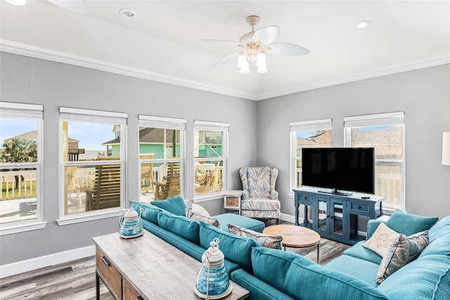 2296 Martinique, Crystal Beach, TX 77650 - living room featuring wood finished floors, a ceiling fan, baseboards, crown molding, and recessed lighting