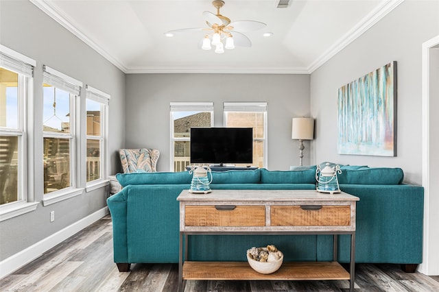 2296 Martinique, Crystal Beach, TX 77650 - living room with a ceiling fan, plenty of natural light, wood finished floors, crown molding, and recessed lighting