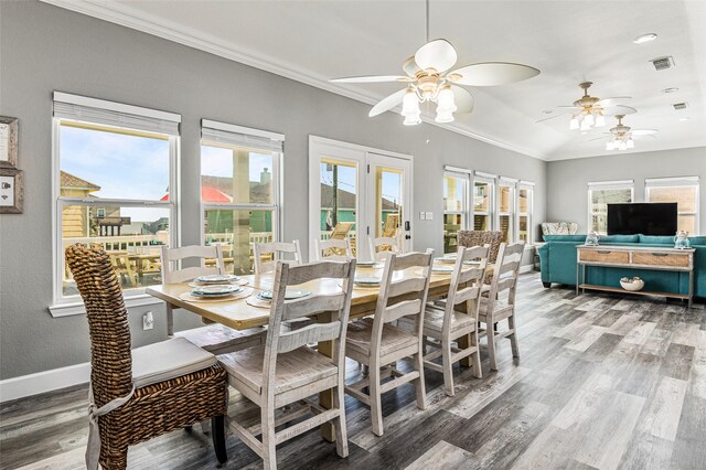 2296 Martinique, Crystal Beach, TX 77650 - dining room with ceiling fan, light wood-type flooring, crown molding, and baseboards