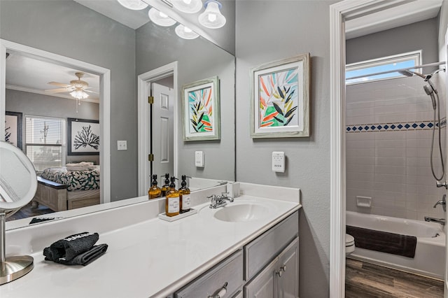 2296 Martinique, Crystal Beach, TX 77650 - full bath with plenty of natural light, toilet, wood finished floors, and vanity