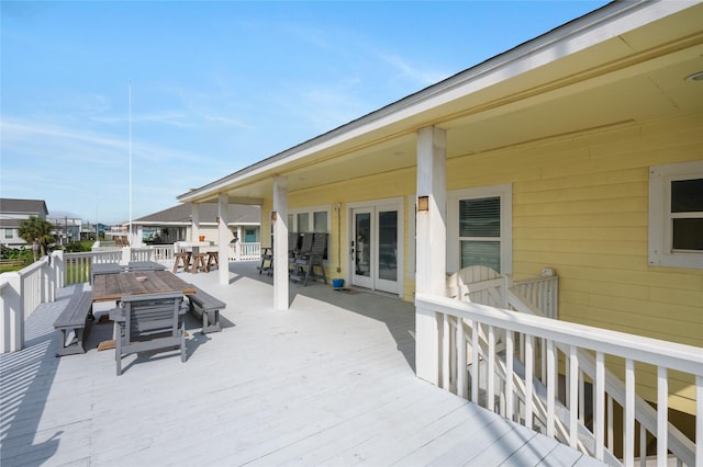 2296 Martinique, Crystal Beach, TX 77650 - view of patio featuring a deck and outdoor dining space