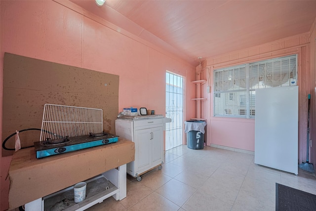 laundry room with light tile patterned flooring