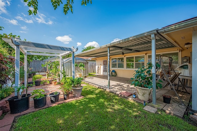view of yard with a patio and a pergola