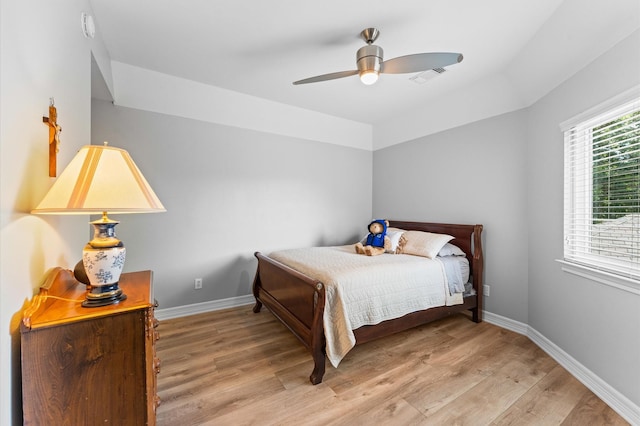 13502 Mount Airy Dr, Cypress, TX 77429 - bedroom featuring light wood-style flooring, baseboards, and a ceiling fan