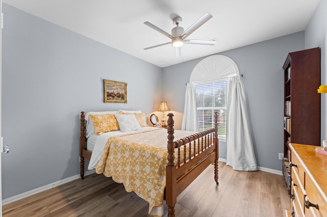 13502 Mount Airy Dr, Cypress, TX 77429 - bedroom featuring wood finished floors, baseboards, and ceiling fan
