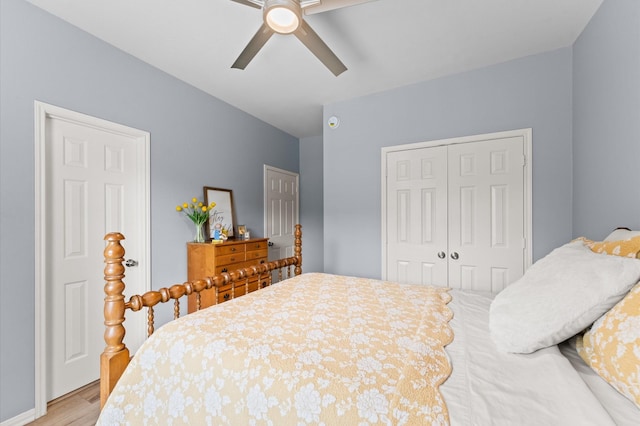 13502 Mount Airy Dr, Cypress, TX 77429 - bedroom with a closet, light wood finished floors, and a ceiling fan