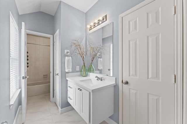 13502 Mount Airy Dr, Cypress, TX 77429 - bathroom with marble look tile flooring, baseboards, vanity, and  shower combination