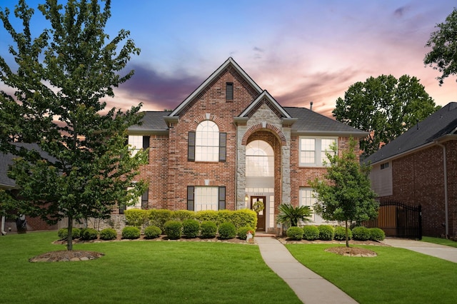 13502 Mount Airy Dr, Cypress, TX 77429 - view of front facade featuring brick siding and a front yard