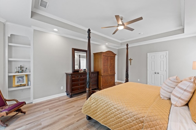 13502 Mount Airy Dr, Cypress, TX 77429 - bedroom with a raised ceiling, light wood-style flooring, recessed lighting, crown molding, and baseboards