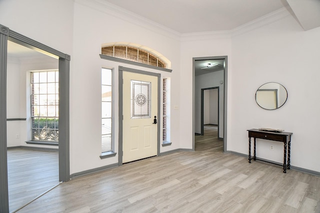 20011 Polly Creek Way, Katy, TX 77450 - foyer entrance with light wood-type flooring, ornamental molding, and baseboards