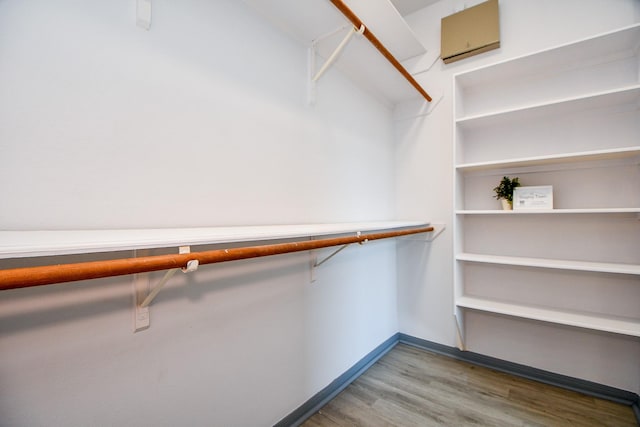 20011 Polly Creek Way, Katy, TX 77450 - spacious closet with wood finished floors