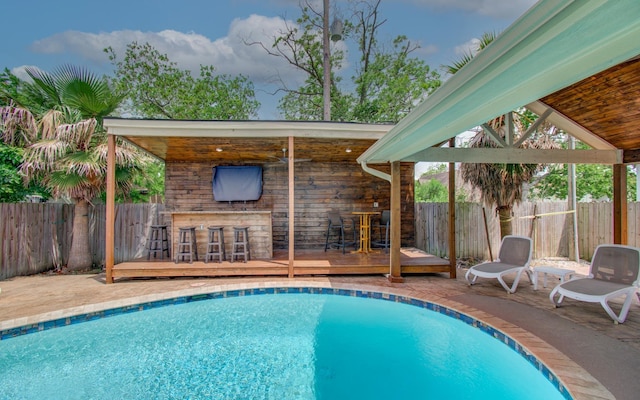 114 Dr Martin Luther King Jr Dr, La Porte, TX 77571 - view of swimming pool featuring a fenced backyard, a deck, and a patio