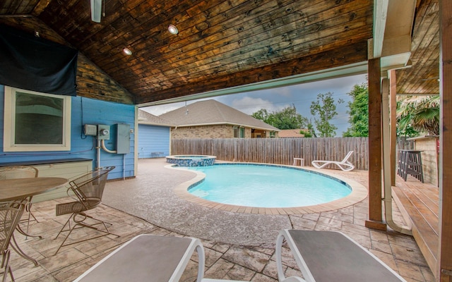 114 Dr Martin Luther King Jr Dr, La Porte, TX 77571 - view of swimming pool with a fenced backyard, a patio, and a pool with connected hot tub