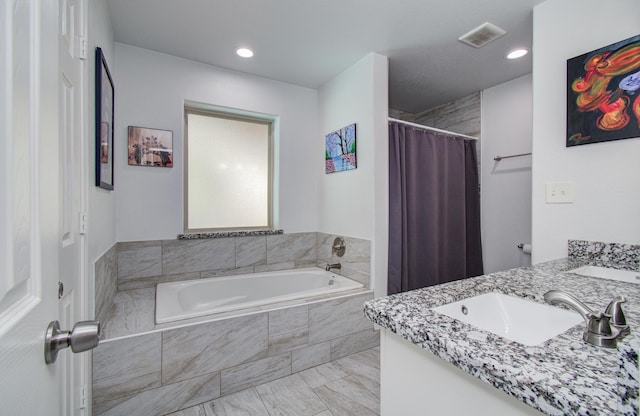 114 Dr Martin Luther King Jr Dr, La Porte, TX 77571 - full bath with a bath, marble look tile flooring, recessed lighting, double vanity, and a shower with shower curtain