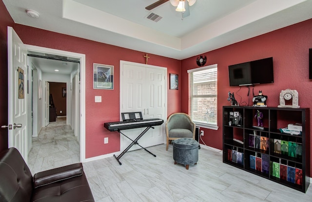 114 Dr Martin Luther King Jr Dr, La Porte, TX 77571 - home office with marble finish flooring, ceiling fan, baseboards, and a raised ceiling