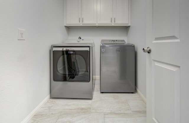 114 Dr Martin Luther King Jr Dr, La Porte, TX 77571 - laundry room featuring cabinet space, independent washer and dryer, and baseboards