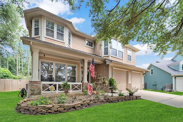 view of front of home featuring an attached garage, a porch, concrete driveway, and stone siding
