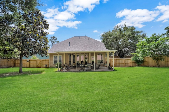 back of house featuring roof with shingles and a patio