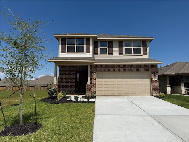 4329 W Bayou Maison Cir, Dickinson, TX 77539 - view of front of property featuring an attached garage, concrete driveway, a front lawn, and brick siding