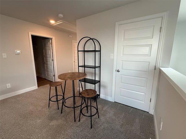 4329 W Bayou Maison Cir, Dickinson, TX 77539 - dining area with dark colored carpet and baseboards