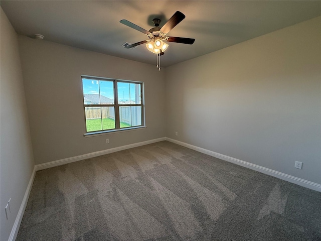 4329 W Bayou Maison Cir, Dickinson, TX 77539 - carpeted empty room with baseboards, a ceiling fan, and a smoke detector