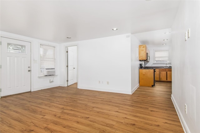 1614 Ursuline St, Galveston, TX 77550 - foyer featuring light wood finished floors, baseboards, and recessed lighting