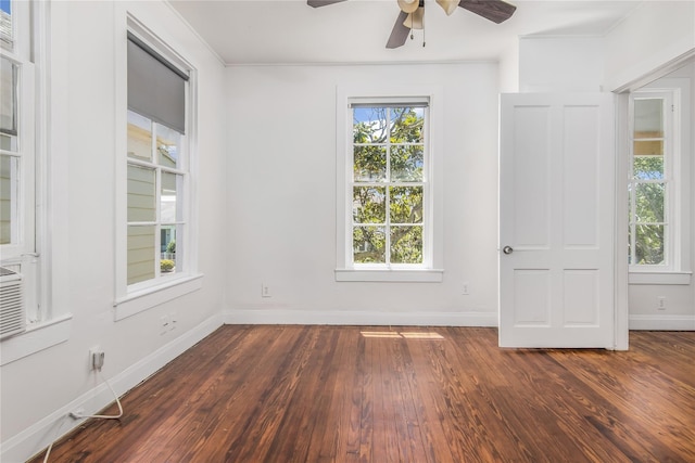 1614 Ursuline St, Galveston, TX 77550 - unfurnished room with a ceiling fan, dark wood-type flooring, baseboards, and ornamental molding