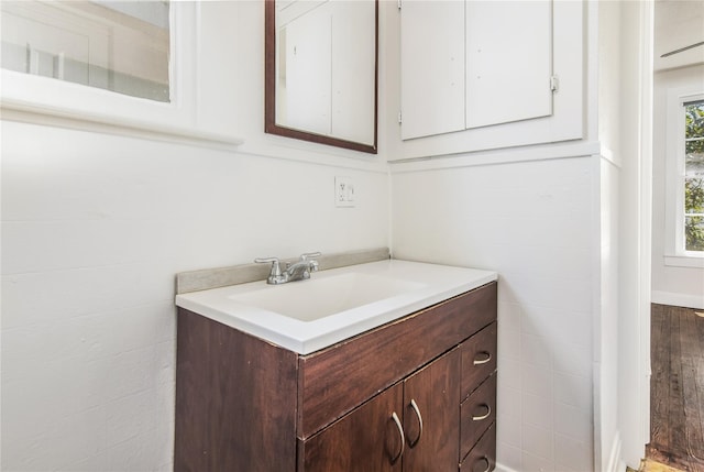 1614 Ursuline St, Galveston, TX 77550 - bathroom with vanity and wood finished floors