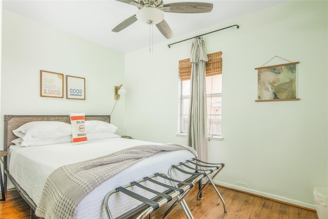 1614 Ursuline St, Galveston, TX 77550 - bedroom featuring wood finished floors, baseboards, and a ceiling fan