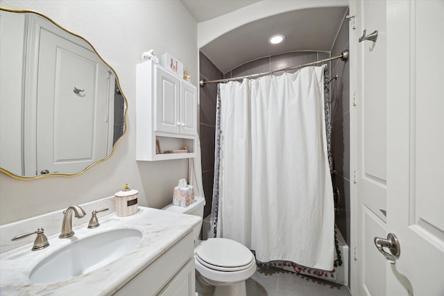 2729 Cohn St, Houston, TX 77007 - bathroom with tile patterned floors, vanity, and toilet