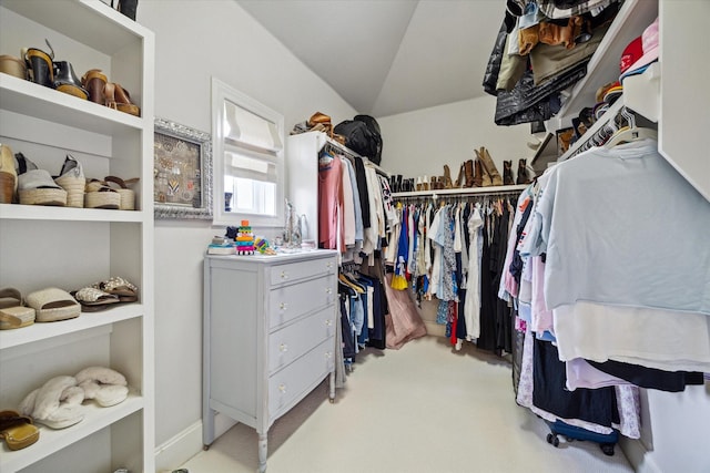 2729 Cohn St, Houston, TX 77007 - spacious closet featuring lofted ceiling and carpet floors