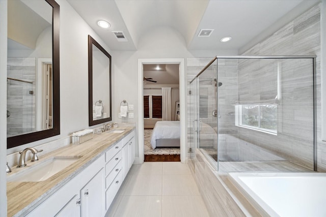 2729 Cohn St, Houston, TX 77007 - bathroom with tile patterned flooring, a shower stall, connected bathroom, ceiling fan, and double vanity
