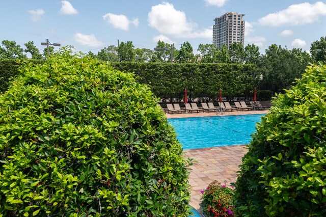 community pool featuring a patio