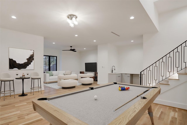 2702 Westgrove Ln, Houston, TX 77027 - recreation room featuring light wood-style floors, baseboards, a sink, recessed lighting, and billiards table