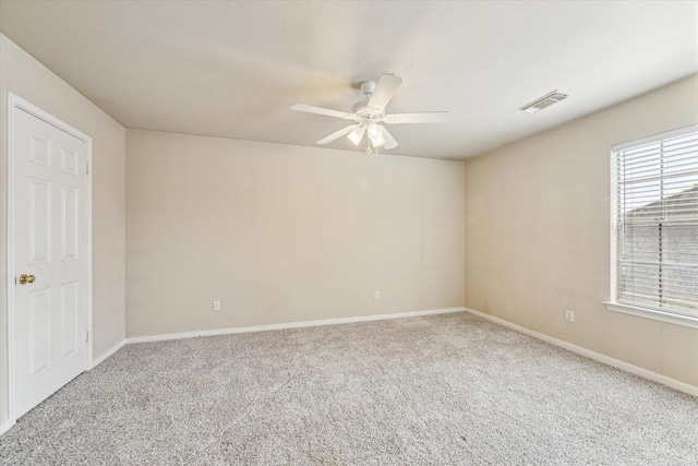 1301 Wilderness Pines Dr, Friendswood, TX 77546 - carpeted spare room featuring ceiling fan and baseboards