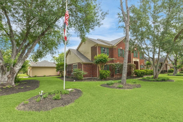 1301 Wilderness Pines Dr, Friendswood, TX 77546 - view of front facade with brick siding and a front lawn