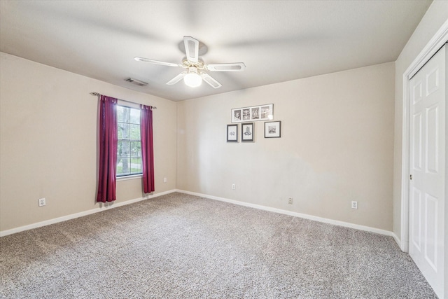 1301 Wilderness Pines Dr, Friendswood, TX 77546 - unfurnished bedroom with carpet flooring, baseboards, and a ceiling fan