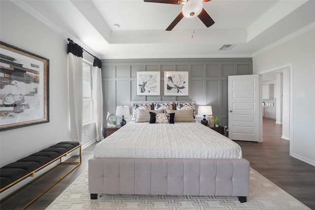 11034 Moon Light Dr, Needville, TX 77461 - bedroom with a raised ceiling, ornamental molding, wood finished floors, baseboards, and a ceiling fan