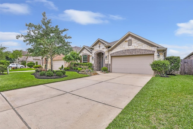 23435 Banks Mill Dr, New Caney, TX 77357 - french provincial home with stone siding, a garage, and driveway