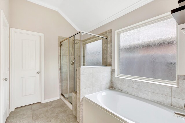 23435 Banks Mill Dr, New Caney, TX 77357 - bathroom featuring a shower stall, lofted ceiling, a garden tub, crown molding, and tile patterned flooring