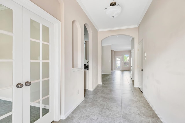 23435 Banks Mill Dr, New Caney, TX 77357 - hall featuring arched walkways, crown molding, and baseboards
