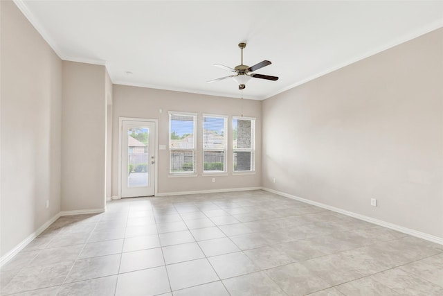 23435 Banks Mill Dr, New Caney, TX 77357 - spare room with a ceiling fan, crown molding, light tile patterned floors, and baseboards