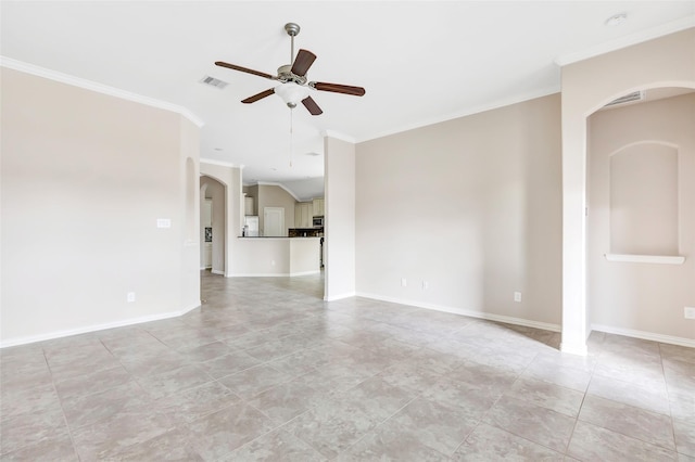 23435 Banks Mill Dr, New Caney, TX 77357 - spare room featuring ornamental molding, a ceiling fan, arched walkways, light tile patterned floors, and baseboards