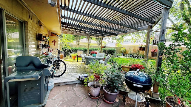 view of patio / terrace featuring a fenced backyard, a pergola, and a deck