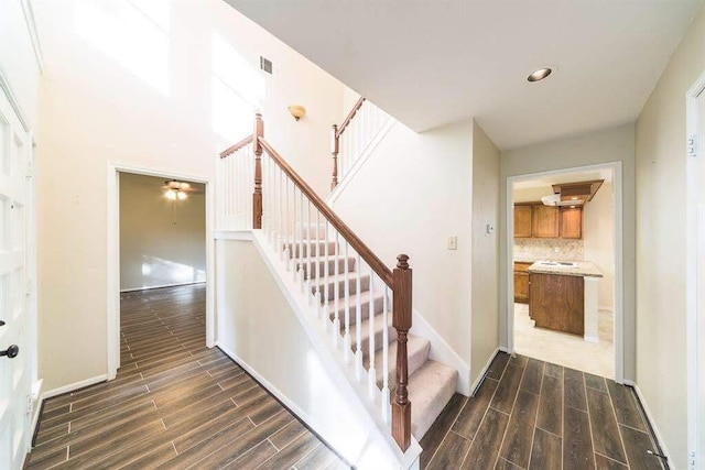 2707 Williams Grant St, Sugar Land, TX 77479 - staircase with wood tiled floors, baseboards, recessed lighting, and ceiling fan