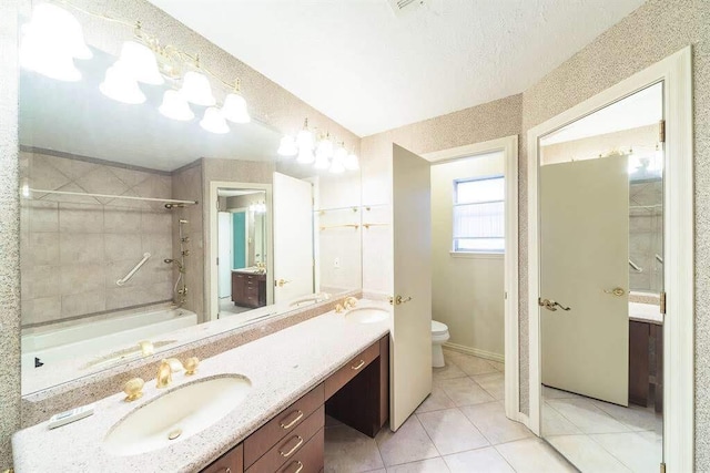 2707 Williams Grant St, Sugar Land, TX 77479 - bathroom with toilet, tile patterned floors, vanity, and tiled shower / bath combo