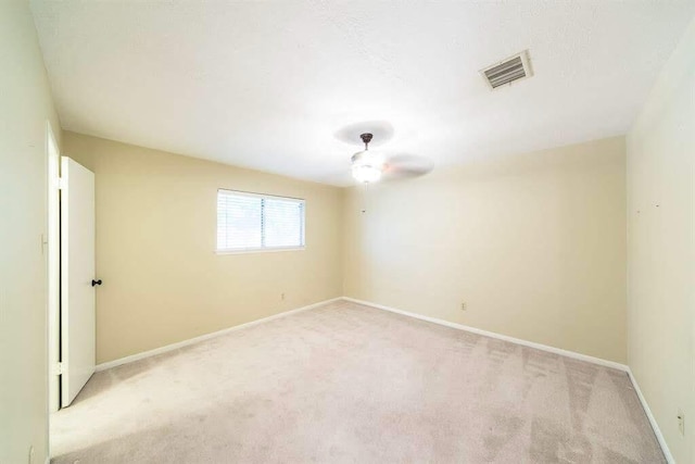 2707 Williams Grant St, Sugar Land, TX 77479 - unfurnished room featuring light colored carpet, baseboards, and ceiling fan