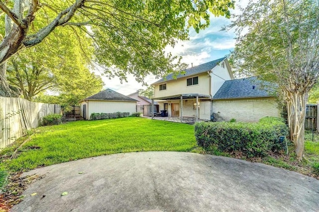 2707 Williams Grant St, Sugar Land, TX 77479 - rear view of house featuring a patio area and brick siding