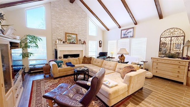 2707 Williams Grant St, Sugar Land, TX 77479 - living area featuring a fireplace, high vaulted ceiling, beam ceiling, and wood finished floors