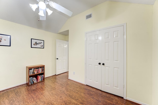 12911 Peach Meadow Dr, Cypress, TX 77429 - unfurnished bedroom featuring vaulted ceiling, wood finished floors, baseboards, a closet, and a ceiling fan